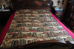 camera da letto - copriletto con libri